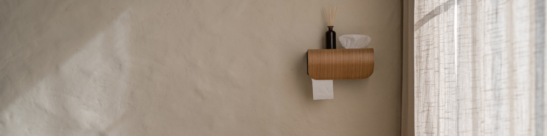 CAPTAIN wall-mounted toilet roll holder with wet wipes dispenser & inner shelf—elegant, space-saving plywood design with concealed storage.
